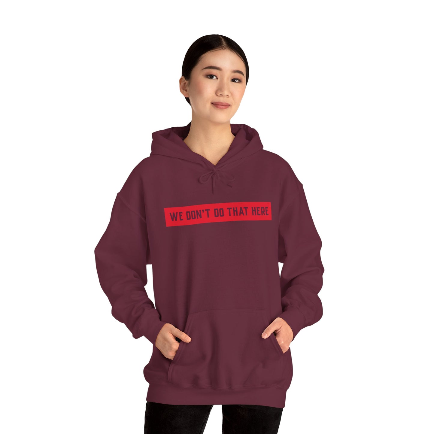 Hoodie — "We Don't Do That Here" Red Box Minimal Graphic Pullover